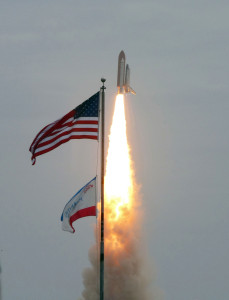 CAPE CANAVERAL, Fla. -- After 30 years and 135 missions, residents and visitors to Florida's Space Coast see this rocket's red glare for the last time as space shuttle Atlantis soars past the American flag after lifting off Launch Pad 39A at NASA's Kennedy Space Center in Florida at 11:29 a.m. EDT on July 8. On board are four experienced astronauts -- STS-135 Commander Chris Ferguson, Pilot Doug Hurley, and Mission Specialists Sandy Magnus and Rex Walheim. STS-135 will deliver the Raffaello multi-purpose logistics module packed with supplies and spare parts for the International Space Station. Atlantis also will fly the Robotic Refueling Mission experiment that will investigate the potential for robotically refueling existing satellites in orbit. In addition, Atlantis will return with a failed ammonia pump module to help NASA better understand the failure mechanism and improve pump designs for future systems. STS-135 will be the 33rd flight of Atlantis, the 37th shuttle mission to the space station, and the 135th and final mission of NASA's Space Shuttle Program. For more information visit, www.nasa.gov/mission_pages/shuttle/shuttlemissions/sts135/index.html. Photo credit: NASA/Fletcher Hildreth